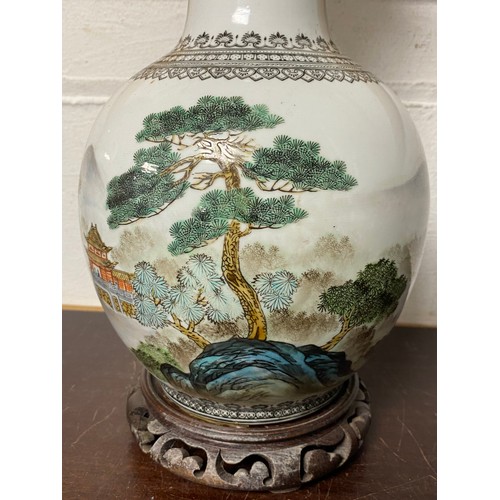 150 - A Chinese vase, enamelled with a landscape -