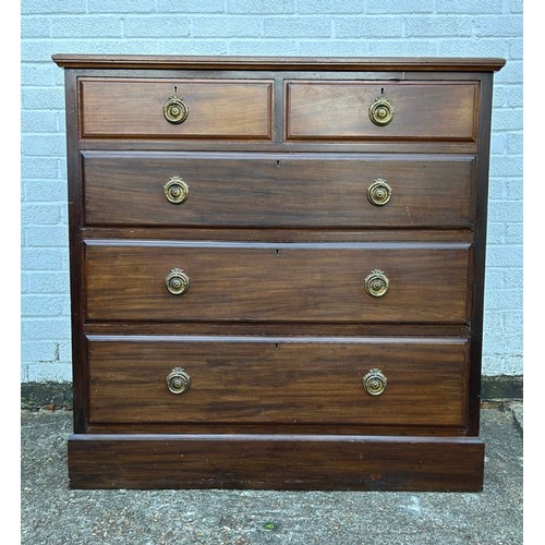 429 - An Edwardian walnut chest of drawers, fitted with two short and three long drawers -