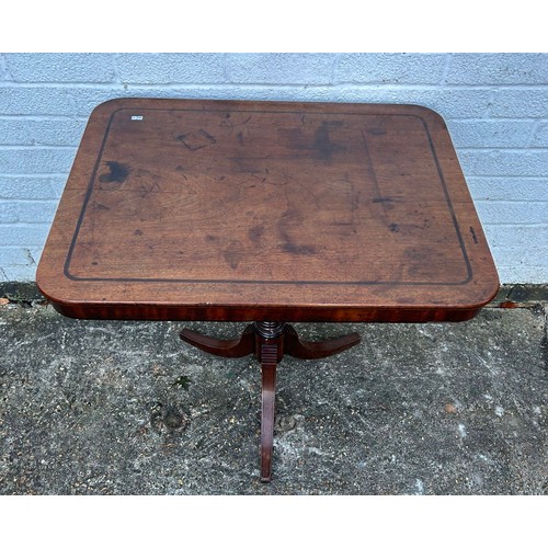 436 - A mahogany and line inlaid snap top table, with rectangular top on ring turned support and three leg... 