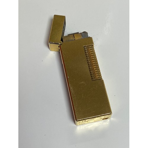 284 - A Dunhill gold plated lighter  -