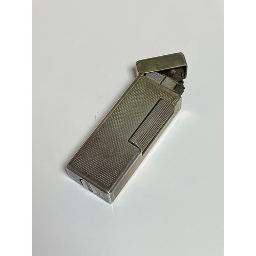 285 - A Dunhill silver toned lighter  -