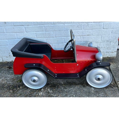 453 - A pedal car, restored, re-painted in red, unkown maker -