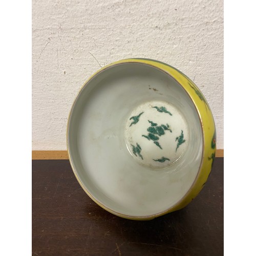 162 - WITHDRAWN: A Chinese famille verte bowl, enamelled with a dragon on yellow ground, and another simil... 