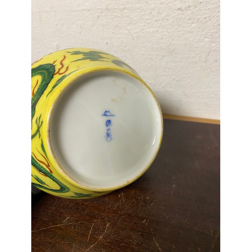 162 - WITHDRAWN: A Chinese famille verte bowl, enamelled with a dragon on yellow ground, and another simil... 