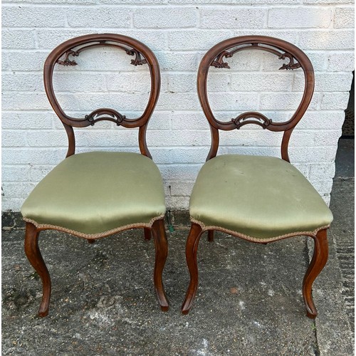 419 - A pair of Victorian balloon back chairs -