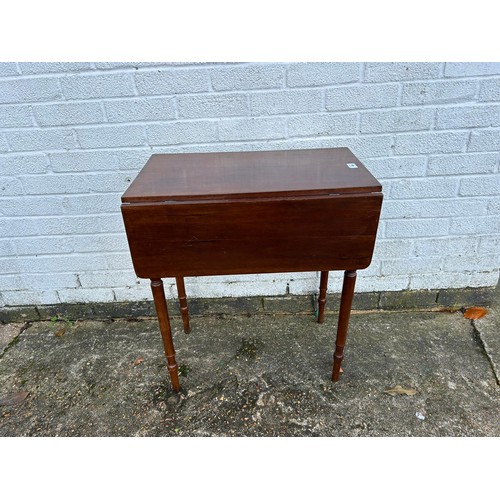 404 - A 19th Century mahogany Pembroke  table, with one real and one dummy drawer, on turned legs -