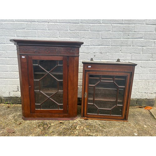 398A - A wall hanging corner cabinet and another wall hanging cabinet -