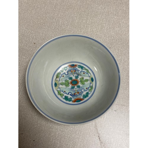 89 - A Chinese bowl, painted with butterflies and flowers, six character mark, together with other items ... 