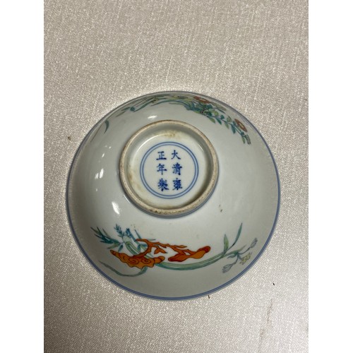 89 - A Chinese bowl, painted with butterflies and flowers, six character mark, together with other items ... 