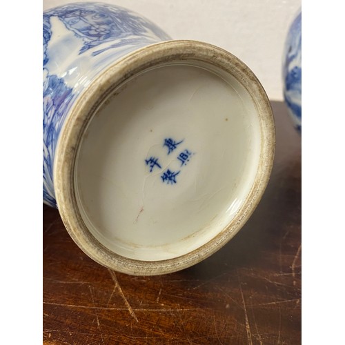 93 - Two Chinese blue and white vases, decorated with figures, four character mark, the second of double ... 