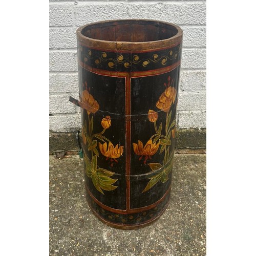 277 - A coopered wooden stick stand painted with flowers -