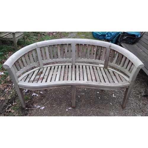 358 - A garden bench, with curved back -