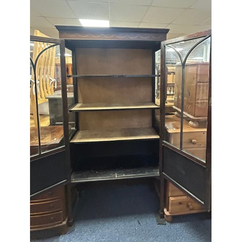 300 - An Edwardian two door display cabinet -