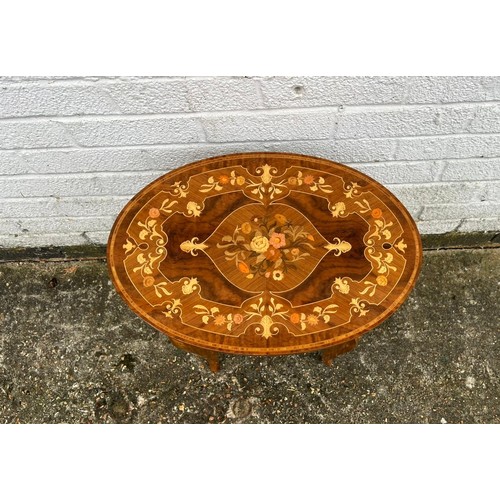 303 - A Sorrento style inlaid musical occasional table with an oval top -