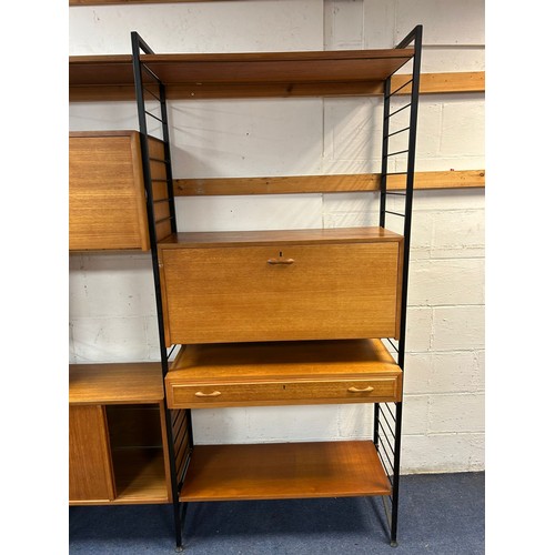 308 - A mid-century teak and metal framed modular Ladderax wall unit/room divider, with three bays, variou... 