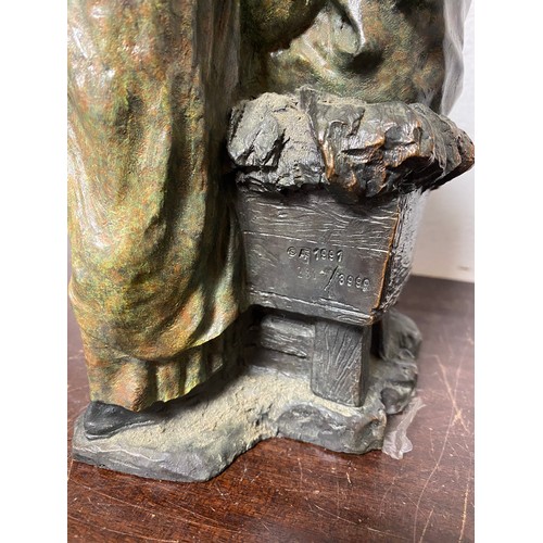 63 - A limited edition 20th century bronze finish group of the Holy Family -