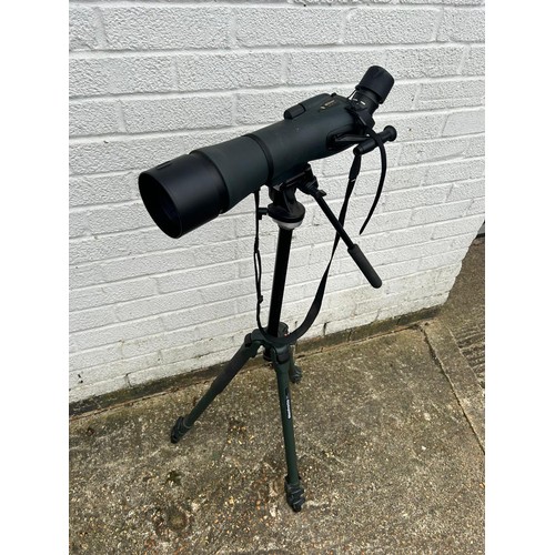 194 - A Nikon spotting scope, on tripod -