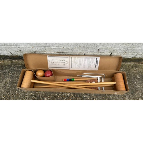 391 - A boxed croquet set -