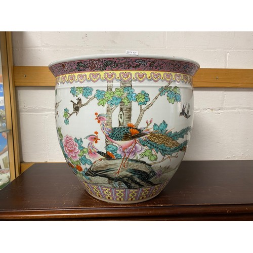 143 - A Chinese fish bowl, painted with birds and verse -