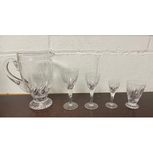 145 - A Stuart crystal part suite of glassware engraved with ferns -