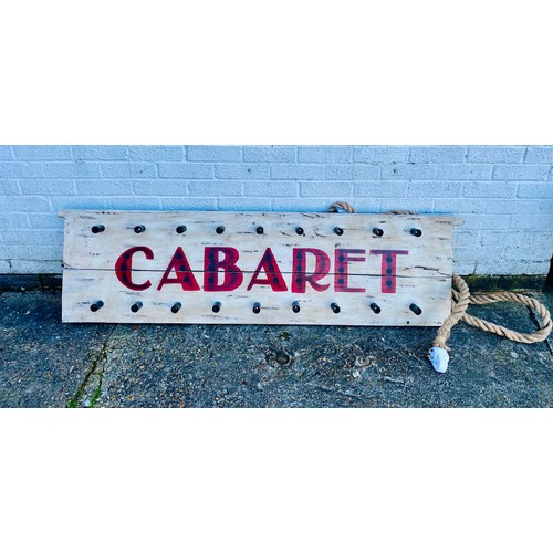 351 - A wall mounted painted wooden 'Cabaret' sign, fitted for electricity -