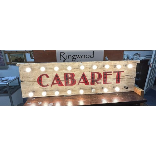 351 - A wall mounted painted wooden 'Cabaret' sign, fitted for electricity -