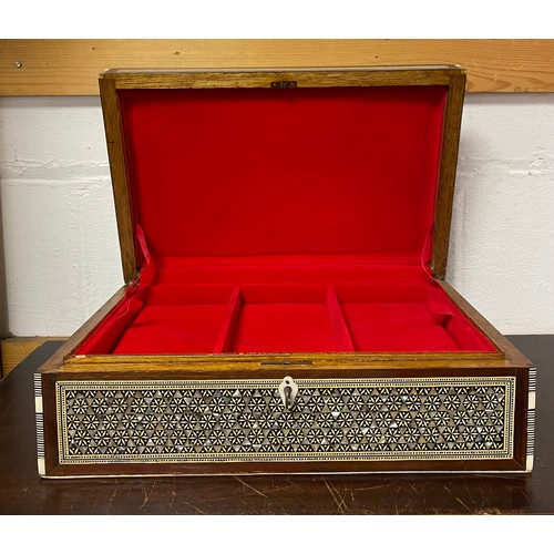 55 - A middle eastern mother of pearl shell and bone inlaid jewellery box, with key -