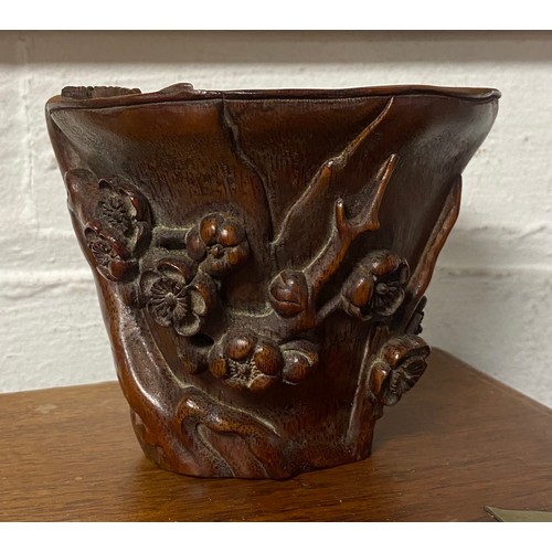 59 - A Chinese carved bamboo libation cup, together with a marriage chest and a stand -