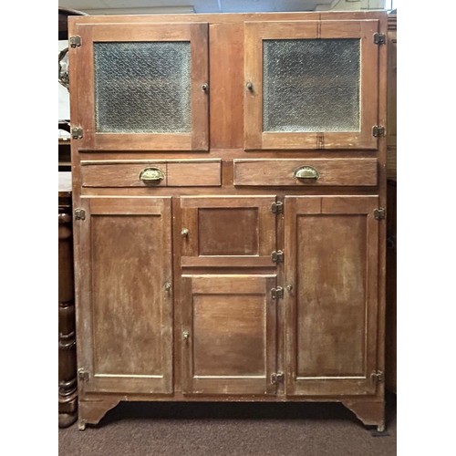 A mid 20th Century kitchen larder/cupboard with two doors over two shelves and four further cupboard doors -