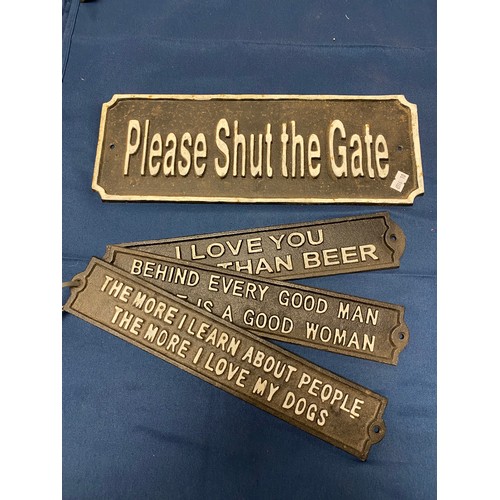 441 - A group of four modern cast iron signs -