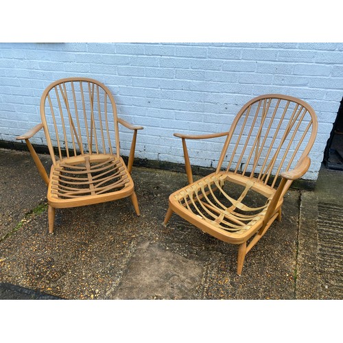 355 - A pair of Ercol Windsor easy chairs (a/f) -