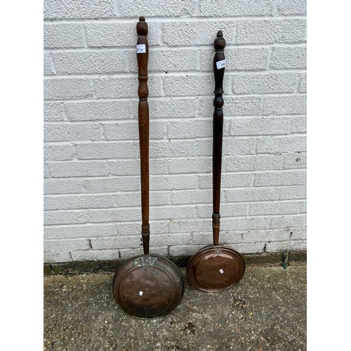 Two copper bowled warming pans -