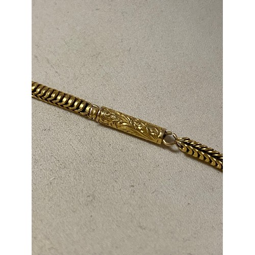 8 - A 19th Century yellow metal choker/necklace, composed of articulated links, to barrel clasp -