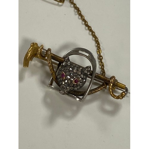 9 - A late Victorian/Edwardian diamond and ruby set foxhead brooch, the diamond set fox with ruby eyes m... 
