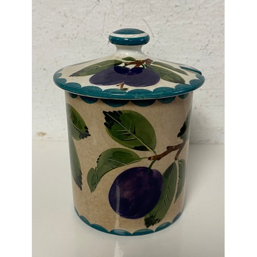 A Wemyss preserves jar and cover, decorated in the plums pattern -