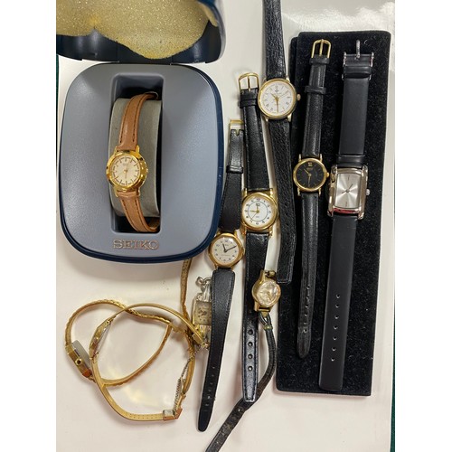 25 - A 9ct gold cased wristwatch, together with other watches -