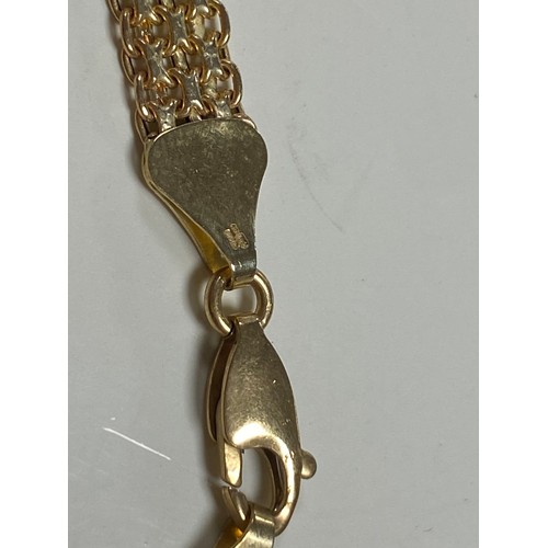 42 - A 9ct gold necklace and matching bracelet -