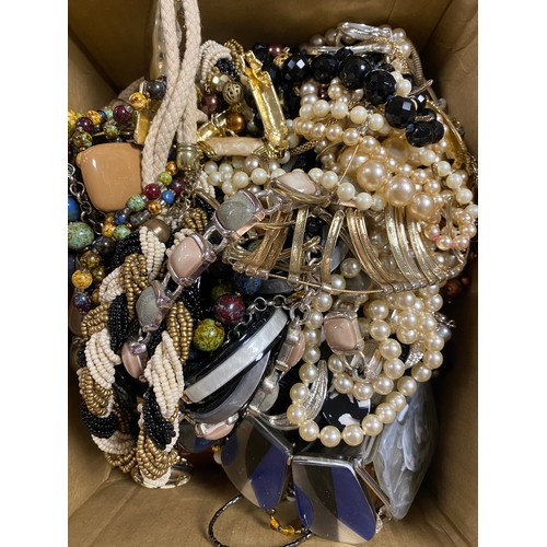 59 - A collection of costume jewellery, including Monet, various gold tone necklaces, earclips, etc -