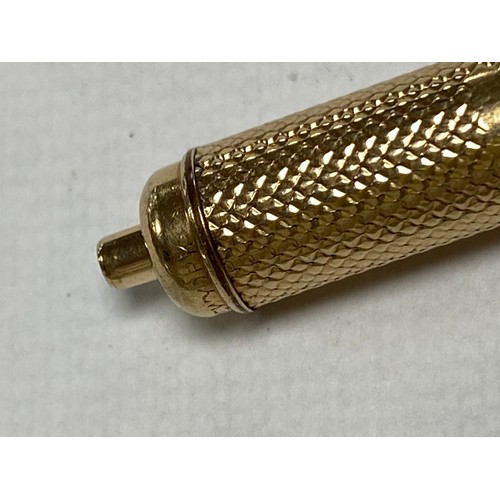 1 - An American yellow metal propelling pencil, by W J Hicks, New York -