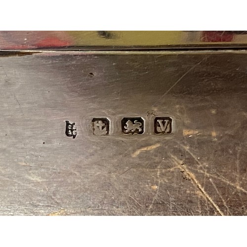 8 - A George VI silver cigarette box, Birmingham 1945, with initials to cover -