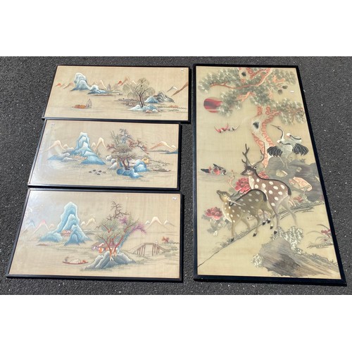 A large Chinese silkwork panel of deer and cranes, and three smaller landscape scenes, each framed -