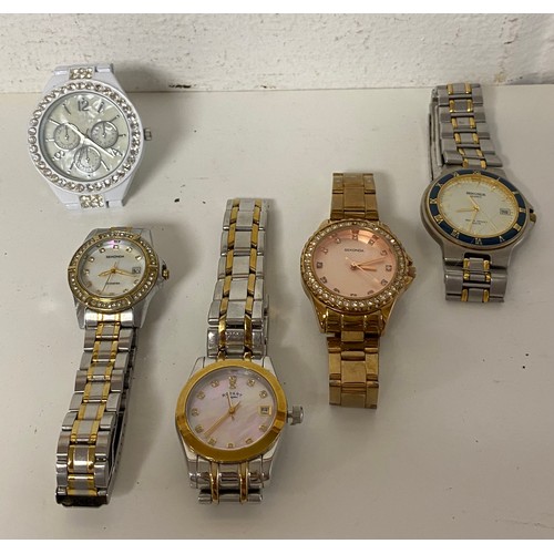 21 - A quantity of modern charms, stamped Pandora and five wristwatches -