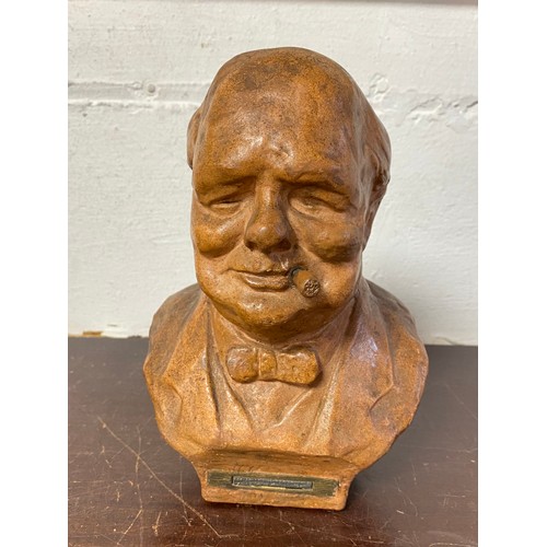 A terracotta table lighter in the form of Sir Winston Churchill -