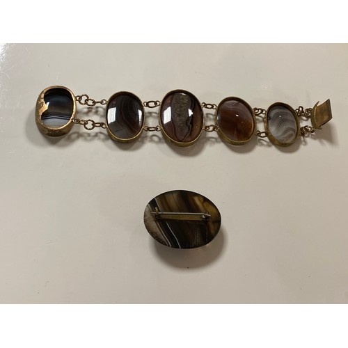 53 - A Victorian agate panel bracelet, composed of five graduated polished specimens, together with an ov... 
