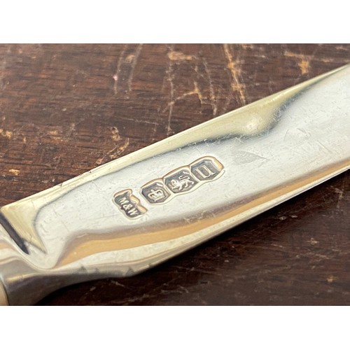 24 - A cased set of six silver handled fruit knives, together with a pair of silver bladed paper knives a... 