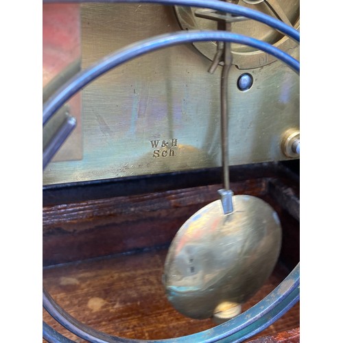 397 - A Victorian mantle/station clock, the movement stamped for Winterhalder and Hofmeier -