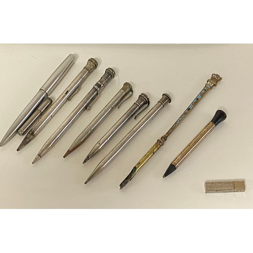 330 - A group of pens and pencils, to include a champleve enamel dip pen and silver propelling pencil -