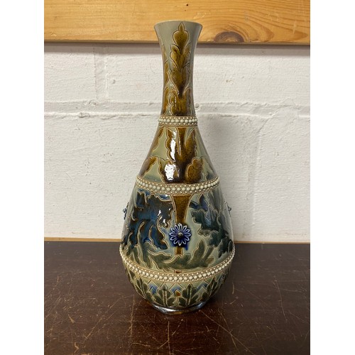 207 - A Doulton Lambeth stoneware vase, decorated with bands of leaves and flowerheads -