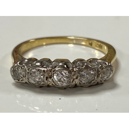 66 - A diamond five stone ring, set with five graduated diamonds in 18ct gold -
