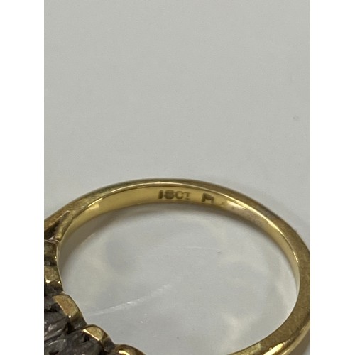 66 - A diamond five stone ring, set with five graduated diamonds in 18ct gold -